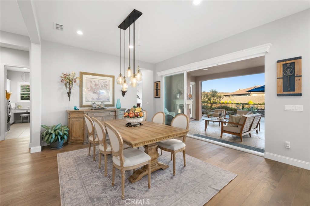1035 Gavin Lane Nipomo, CA 93444 - Photo 16 of 70 a view of a dining room with furniture window and wooden floor