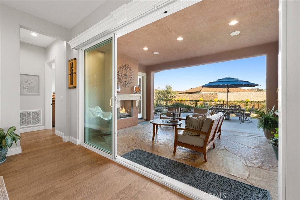 1035 Gavin Lane Nipomo, CA 93444 - Photo 17 of 70 a living room with furniture and a floor to ceiling window