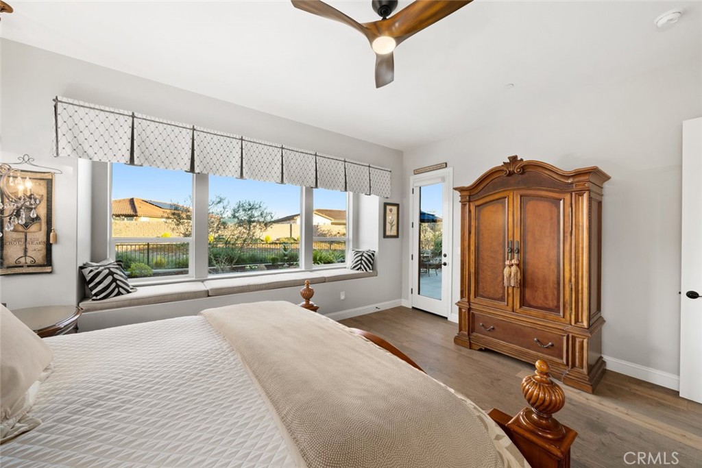 1035 Gavin Lane Nipomo, CA 93444 - Photo 29 of 70 a spacious bedroom with a bed a mirror and windows