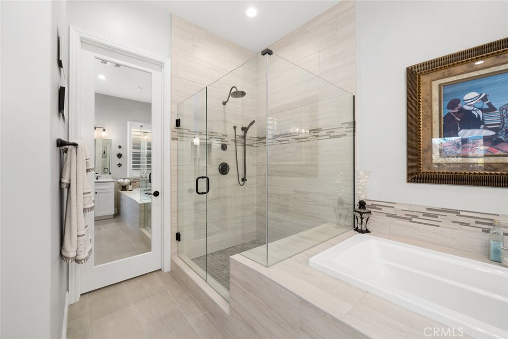 1035 Gavin Lane Nipomo, CA 93444 - Photo 32 of 70 a bathroom with a granite countertop shower mirror and a sink