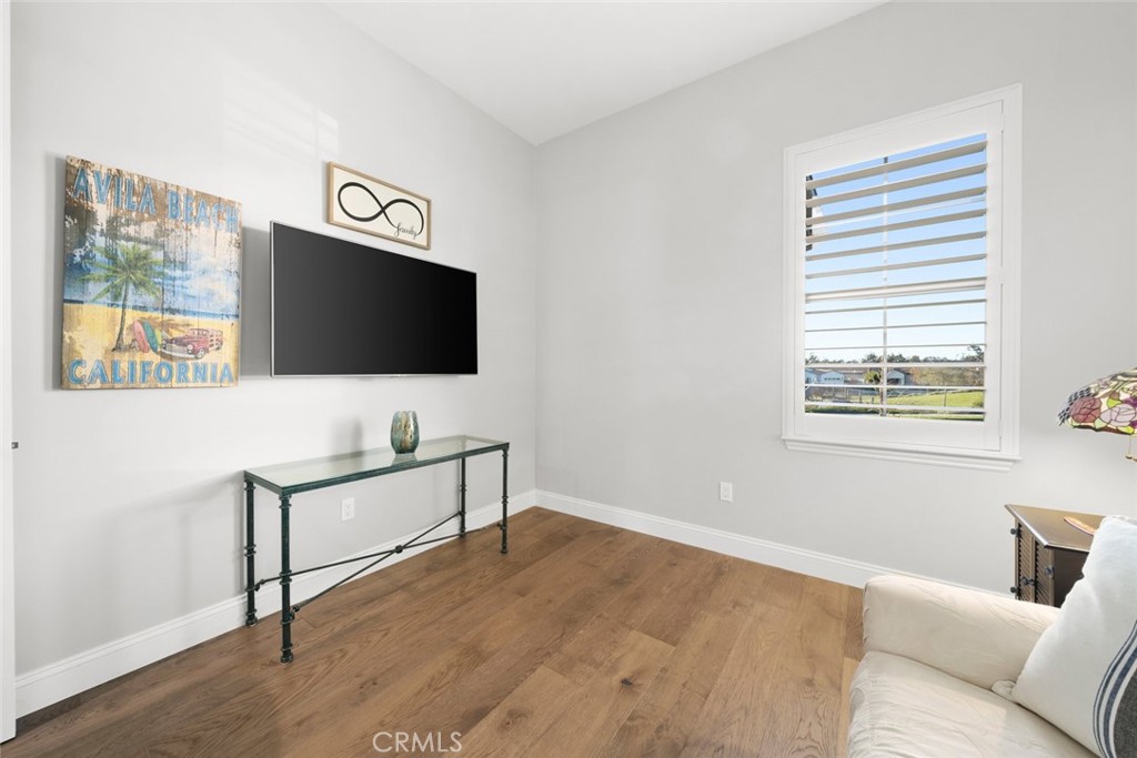1035 Gavin Lane Nipomo, CA 93444 - Photo 42 of 70 a living room with furniture and a flat screen tv