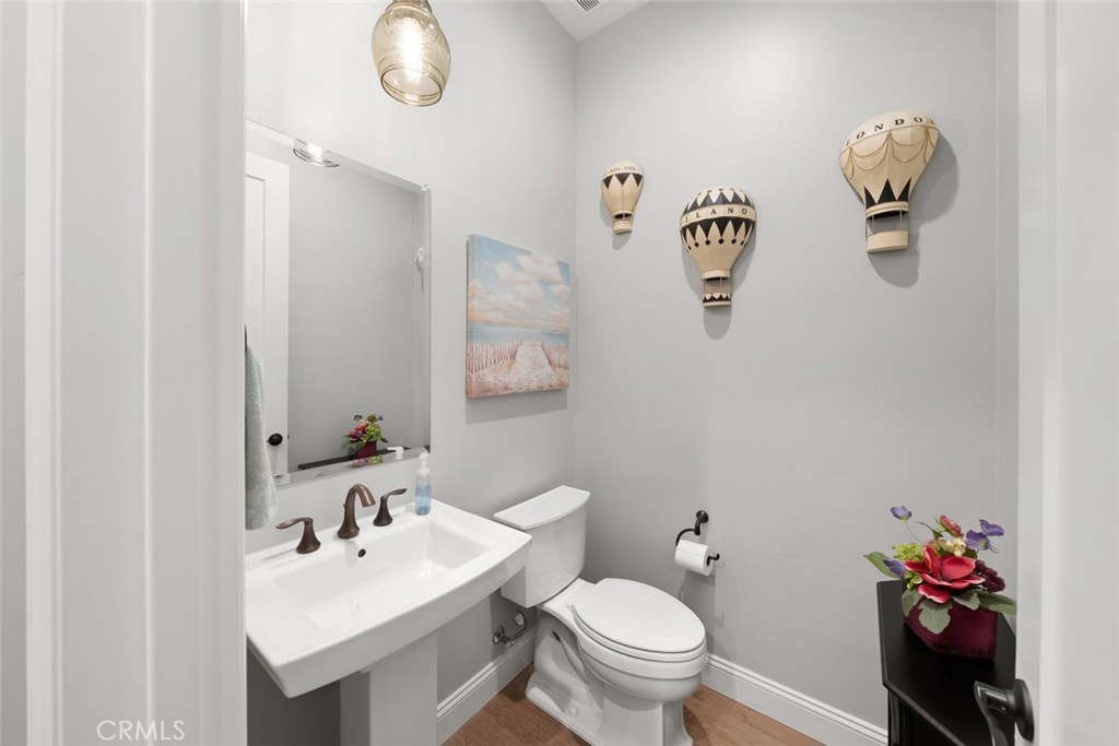 1035 Gavin Lane Nipomo, CA 93444 - Photo 44 of 70 a bathroom with a sink mirror and toilet