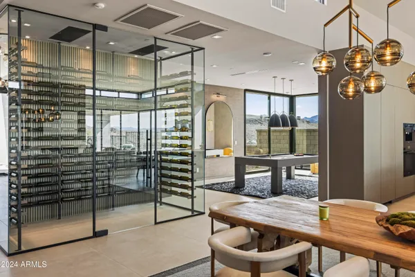 a open kitchen with a table and chairs in it