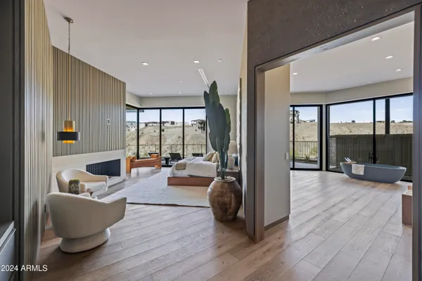 a bathroom with a tub and shower