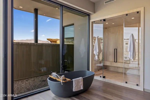 a bathroom with a double vanity sink and mirror