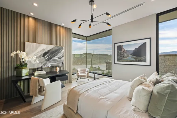 a bathroom with a tub mirror and sink