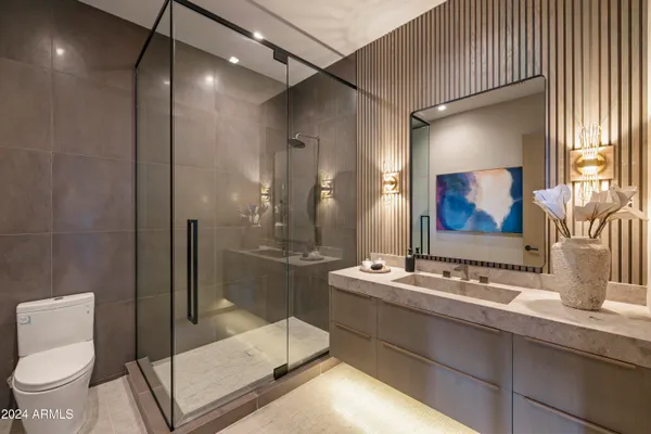 a utility room with sink dryer and washer