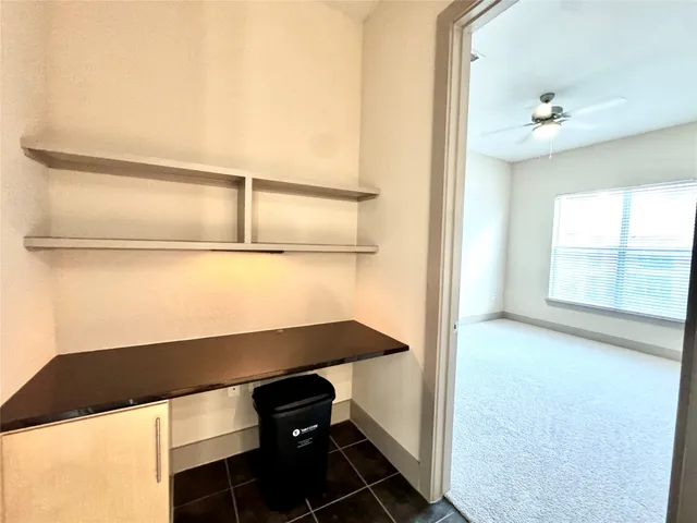 a view of a large building from a balcony