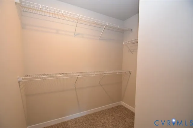 a view of a room with racks on the wall