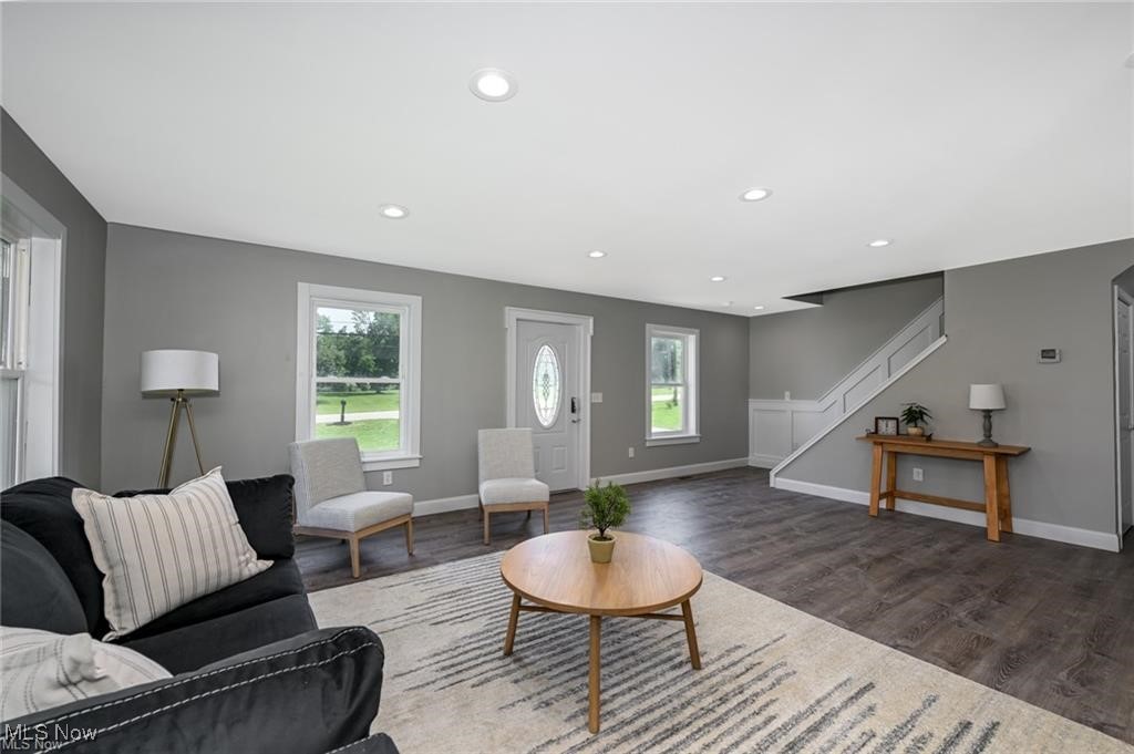 7613 Jefferson Road Ashtabula, OH 44004 - Photo 9 of 35 Living room featuring dark hardwood / wood-style floors