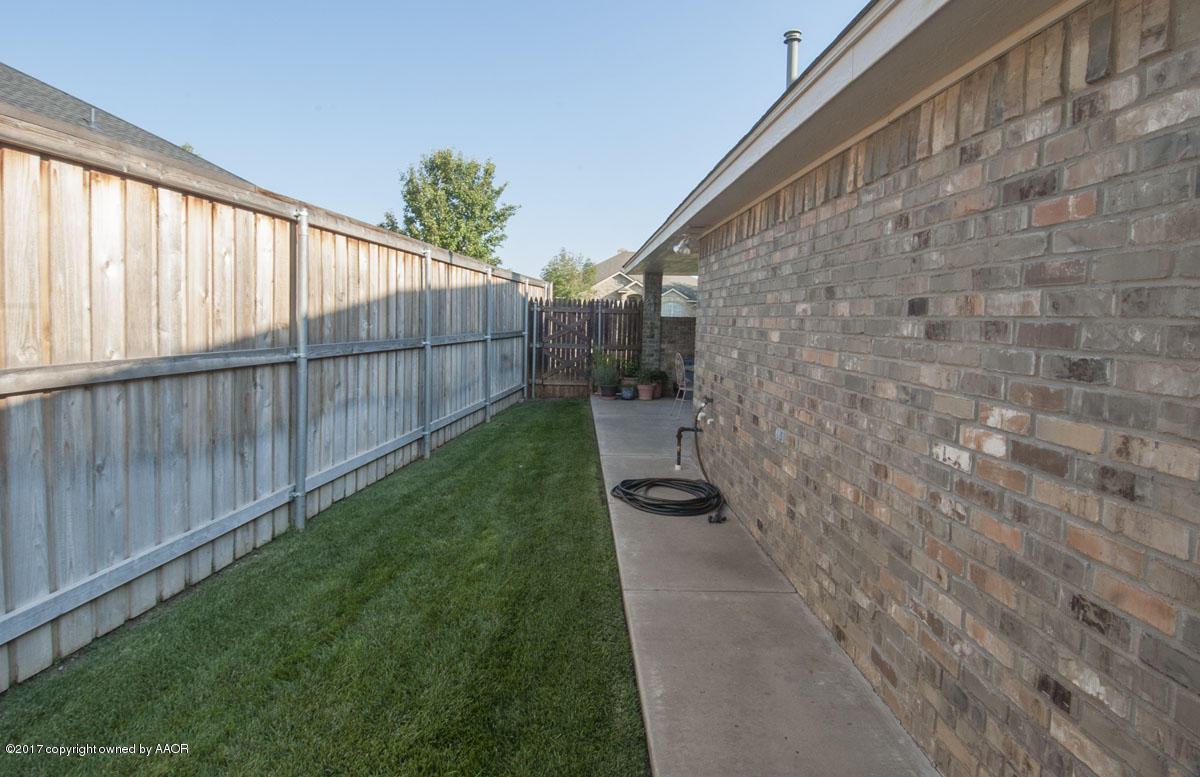 6919 Thunder Road Amarillo, TX 79119 - Photo 33 of 38 SIDE YARD VIEW 2
