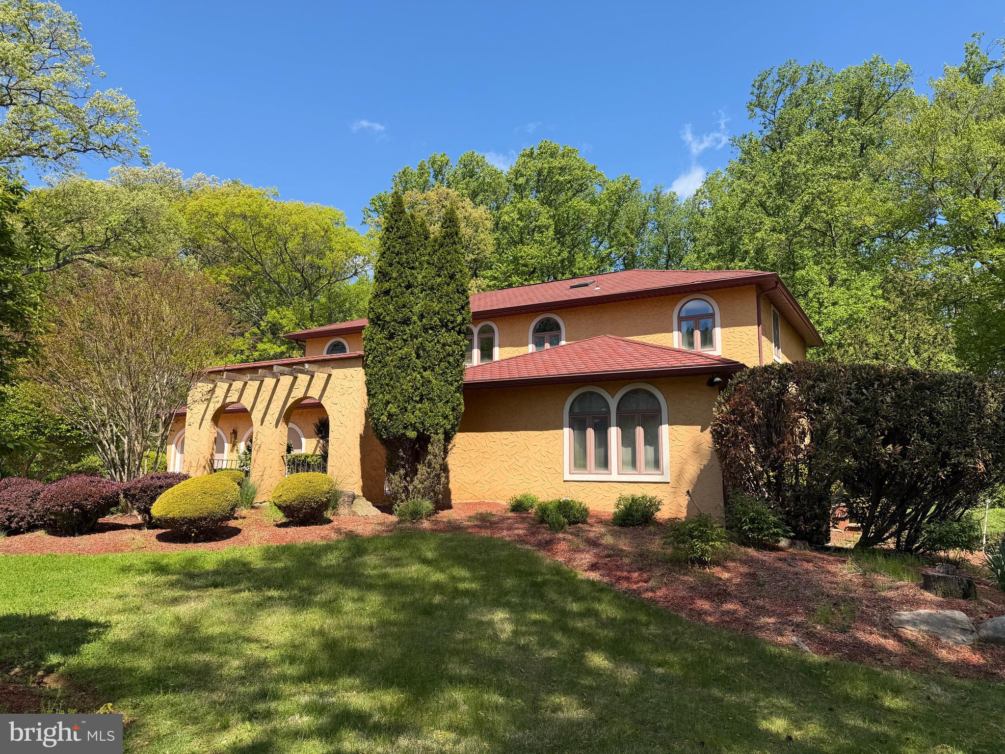 1317 Mettler Road Huntingdon Valley, PA 19006 - Photo 2 of 48 a front view of a house with garden