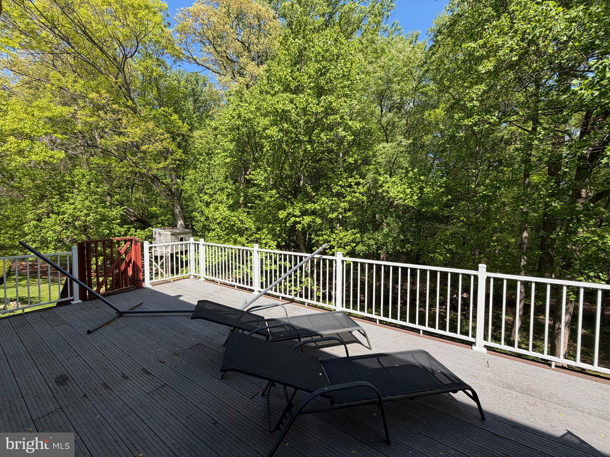 1317 Mettler Road Huntingdon Valley, PA 19006 - Photo 9 of 48 a balcony with wooden floor and outdoor seating
