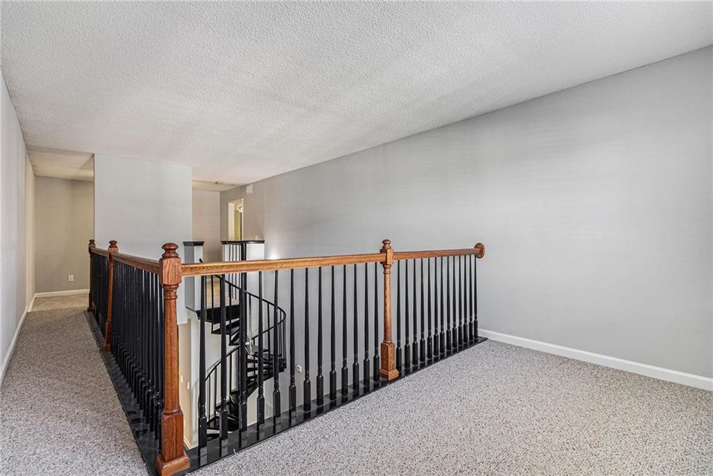 2657 Lenox Road Northeast, Unit 69 Atlanta, GA 30324 - Photo 20 of 31 a view of a hallway with a window