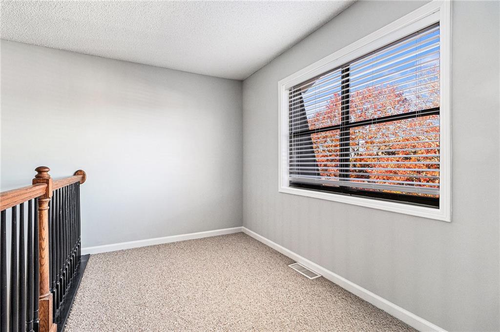 2657 Lenox Road Northeast, Unit 69 Atlanta, GA 30324 - Photo 22 of 31 a view of an empty room with a window