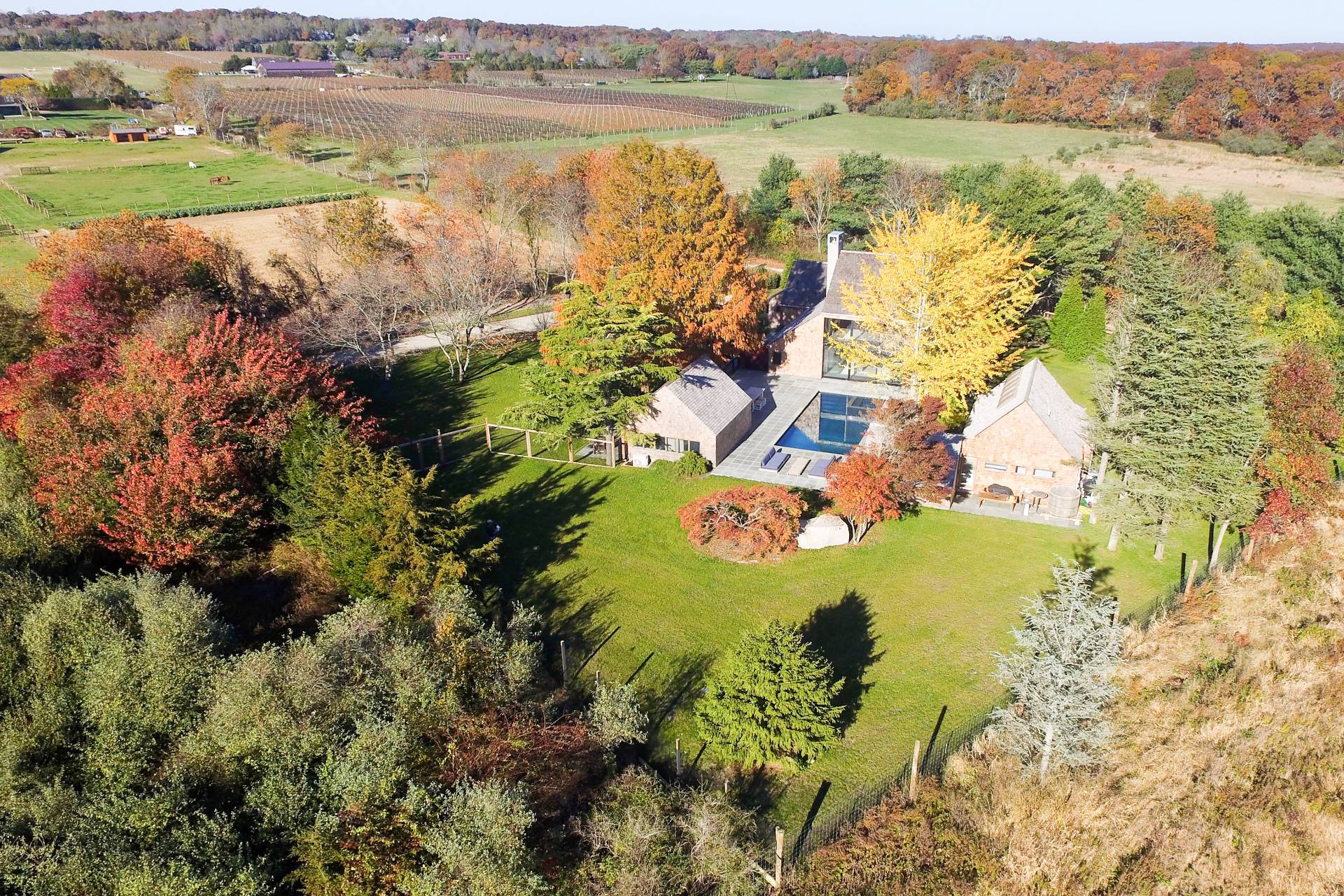 635 Lumber Lane Bridgehampton, NY 11932 - Photo 2 of 27 a view of a lake with a mountain in the background