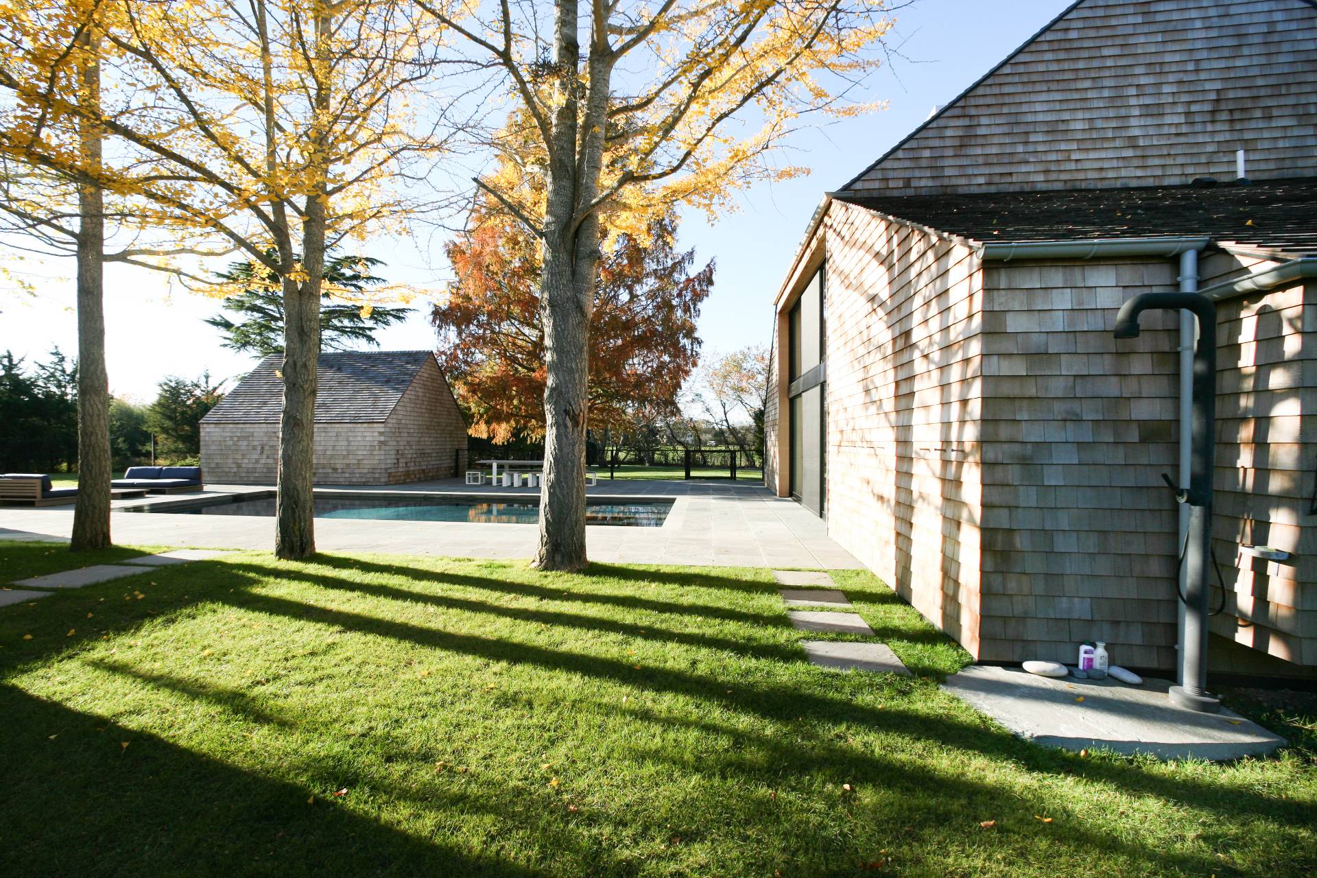 635 Lumber Lane Bridgehampton, NY 11932 - Photo 21 of 27 a view of a backyard with small cabin