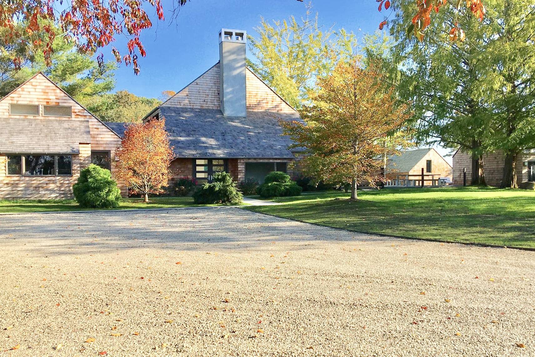 635 Lumber Lane Bridgehampton, NY 11932 - Photo 24 of 27 a view of a house with a swimming pool