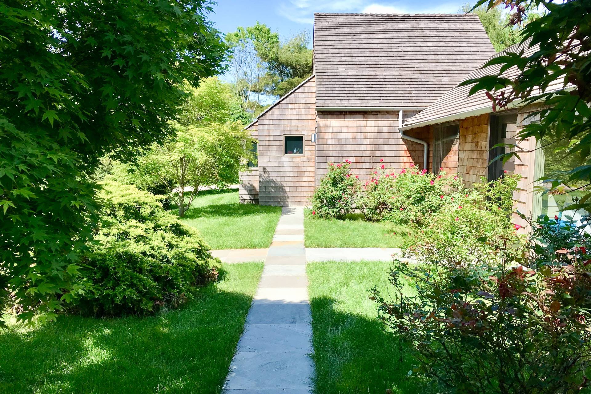635 Lumber Lane Bridgehampton, NY 11932 - Photo 25 of 27 a aerial view of a house with a yard and potted plants