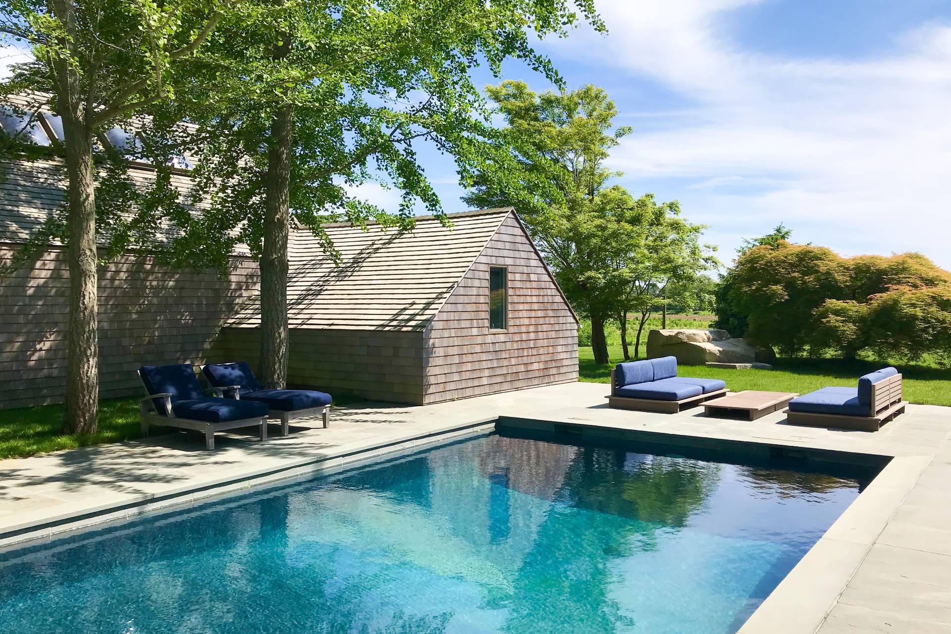 635 Lumber Lane Bridgehampton, NY 11932 - Photo 7 of 27 a view of a house with pool and chairs