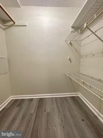 a view of an empty walk in closet