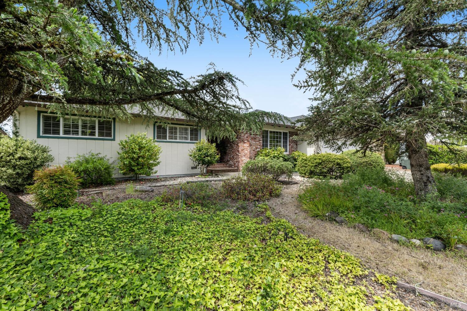 5626 Yerba Buena Road Santa Rosa, CA 95409 - Photo 1 of 1 front view of a house with a yard