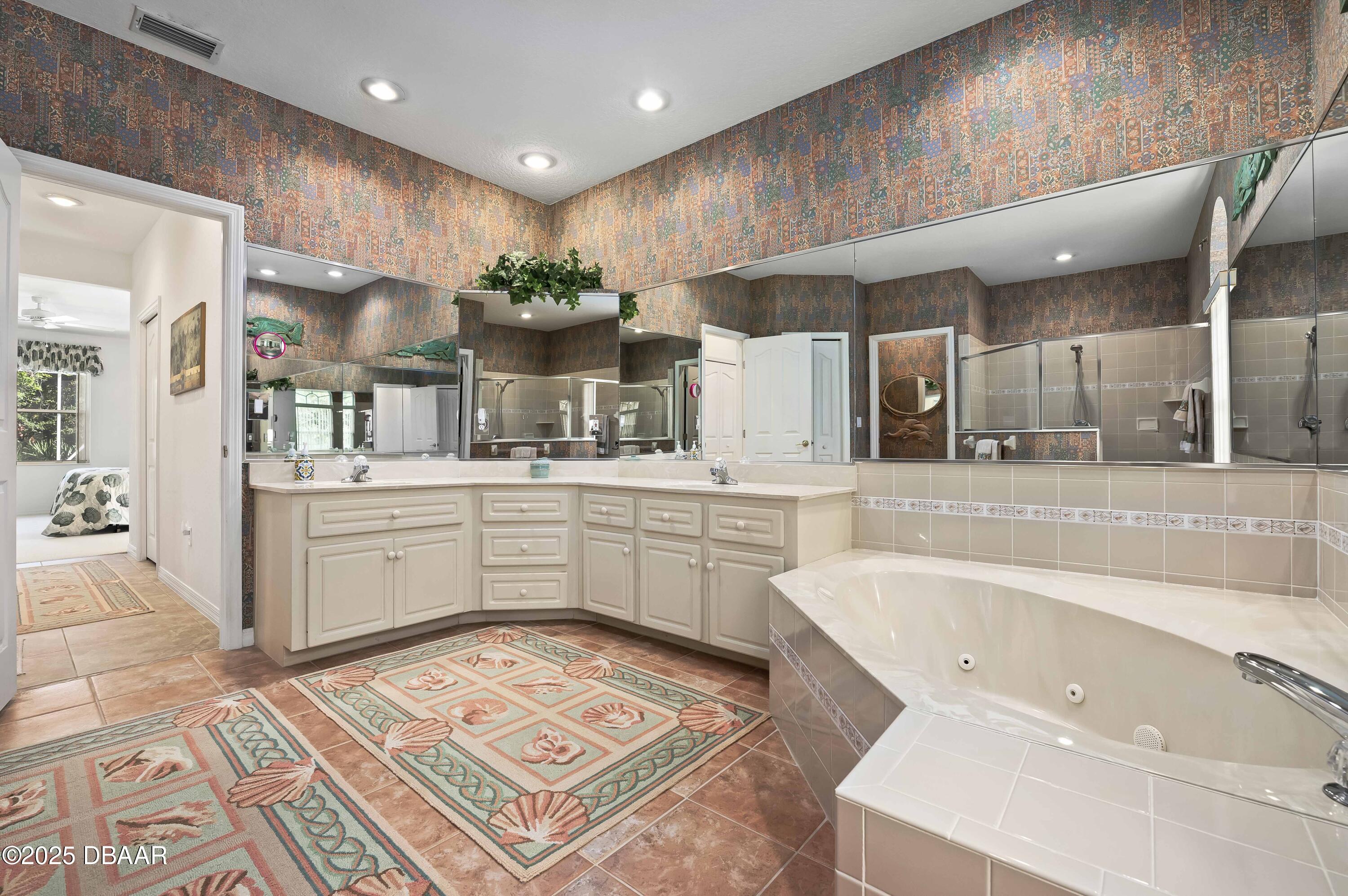 38 South Turn Circle Ponce Inlet, FL 32127 - Photo 18 of 49 a large white kitchen with a large window