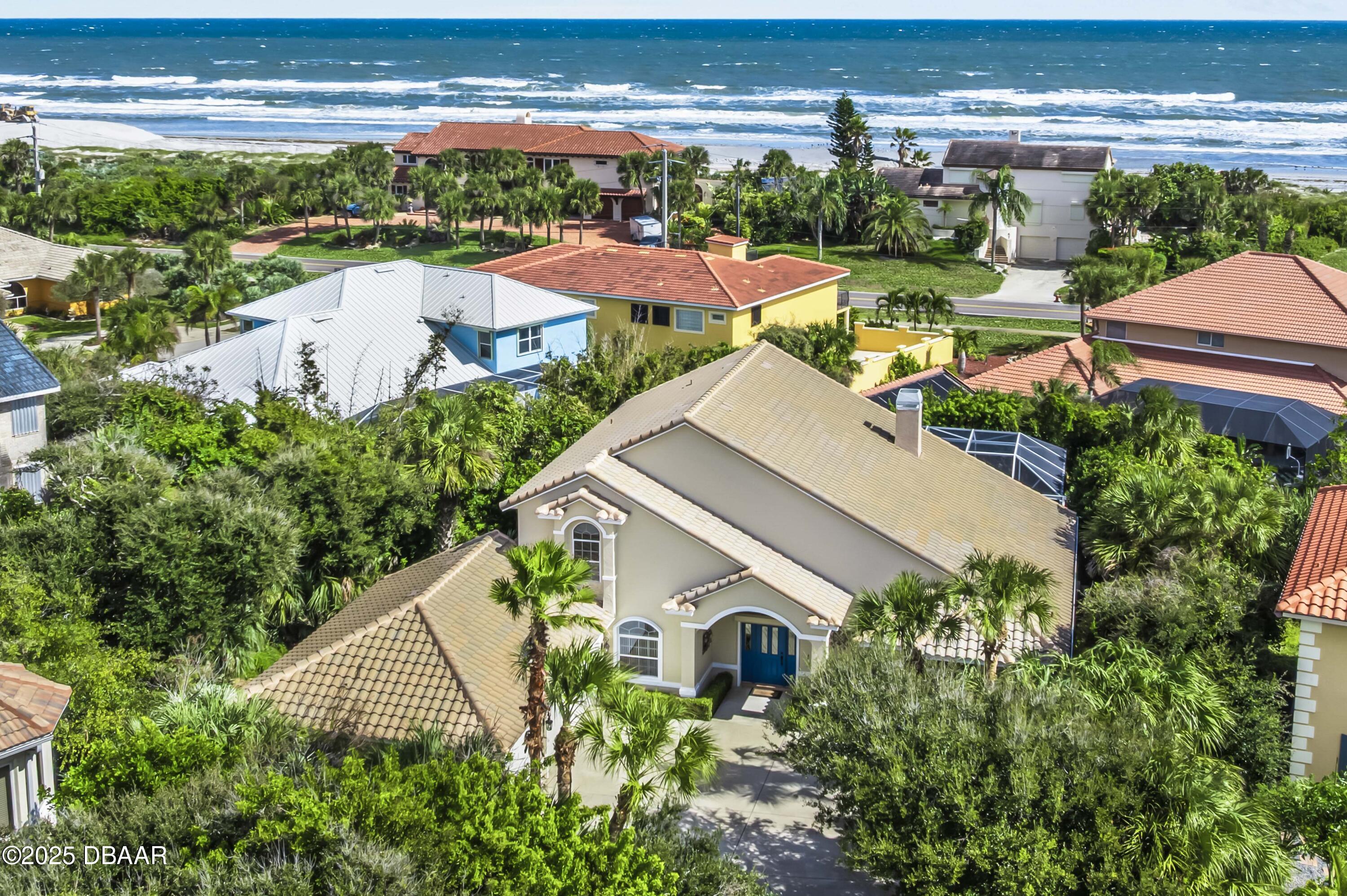 38 South Turn Circle Ponce Inlet, FL 32127 - Photo 2 of 49 an aerial view of a city with lawn chairs