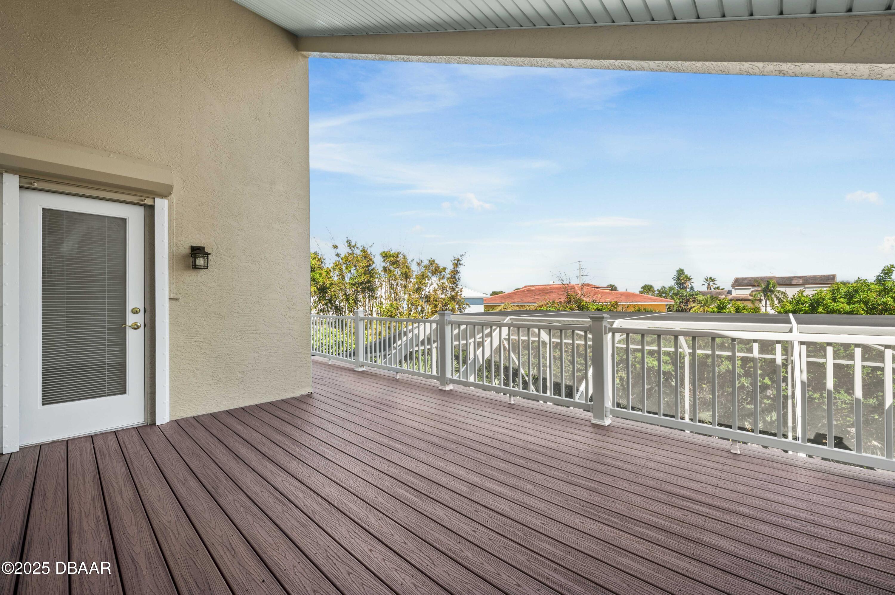 38 South Turn Circle Ponce Inlet, FL 32127 - Photo 33 of 49 a view of a balcony with wooden floor