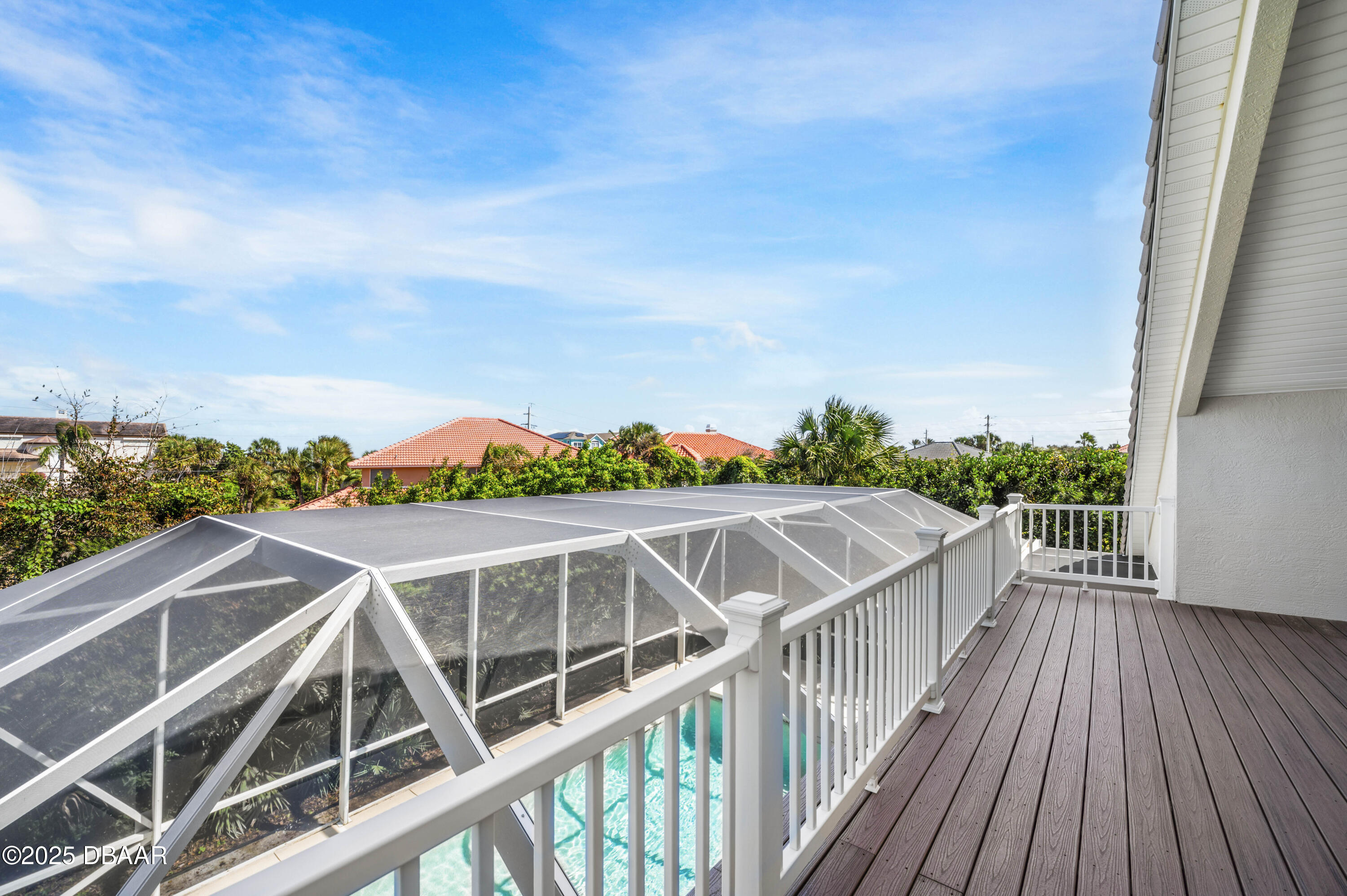 38 South Turn Circle Ponce Inlet, FL 32127 - Photo 34 of 49 a view of a balcony with wooden floor and fence