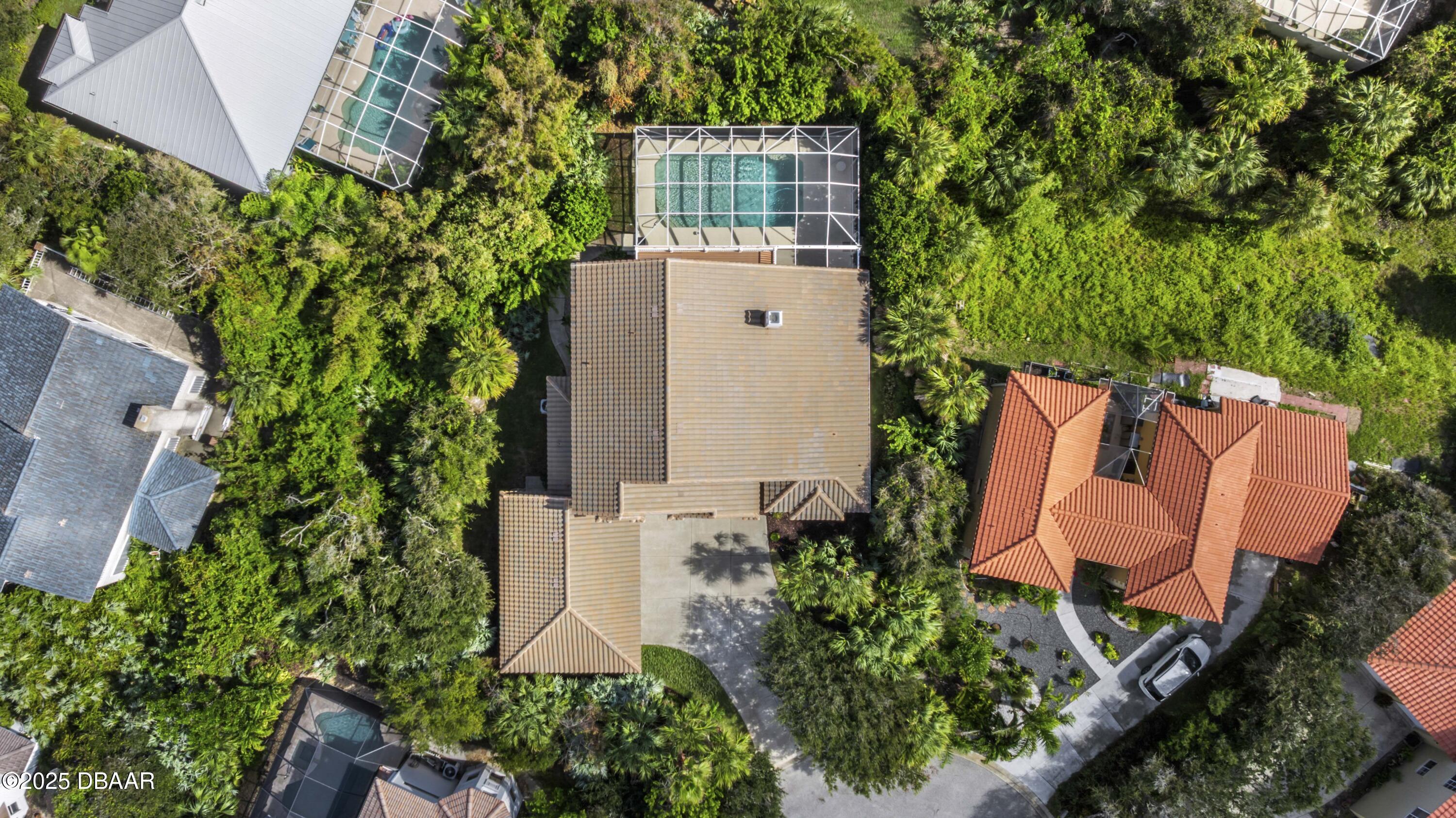 38 South Turn Circle Ponce Inlet, FL 32127 - Photo 6 of 49 an aerial view of a house with a yard and sitting area