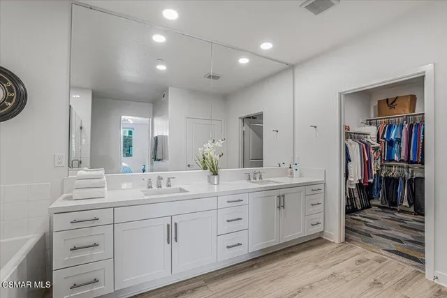 a view of a car parked on the side of a road