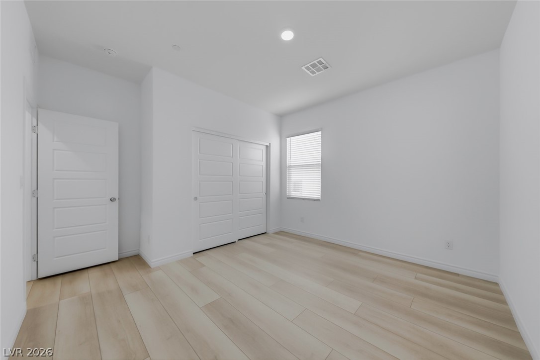 290 Rusty Ridge Lane Henderson, NV 89015 - Photo 21 of 61 Bed 3 with luxury vinyl plank floors & closet