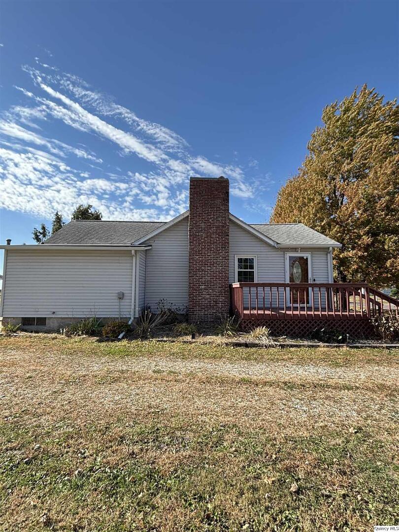41 Main Street Carthage, IL 62321 - Photo 2 of 27 a view of a house with a yard