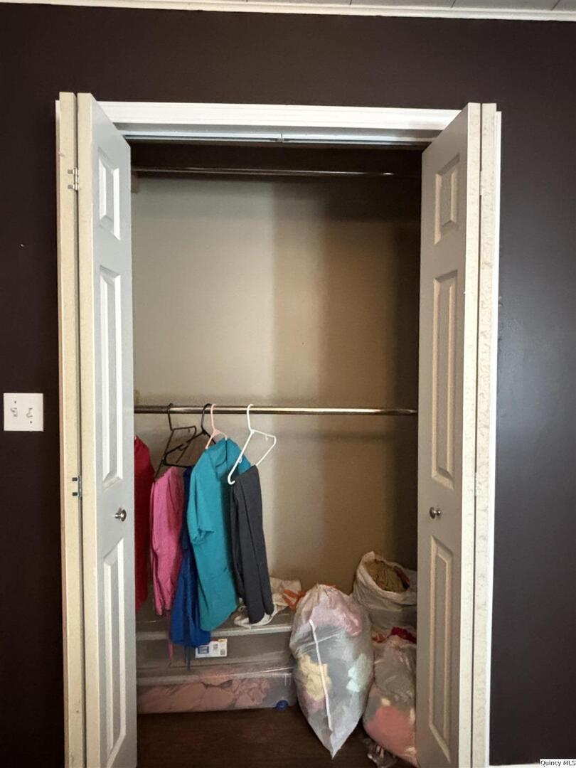 41 Main Street Carthage, IL 62321 - Photo 23 of 27 a view of a walk in closet