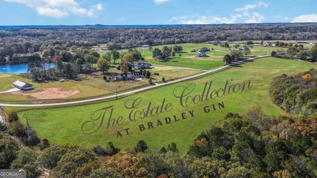 a view of a swimming pool with a yard