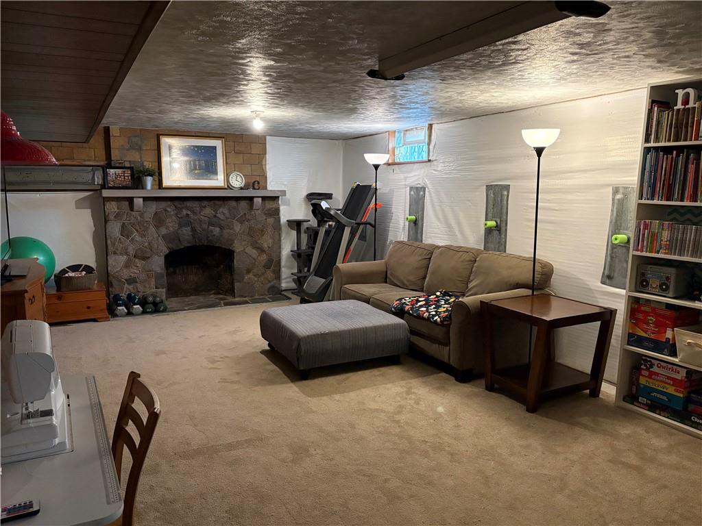800 Tuscarawas Road Beaver, PA 15009 - Photo 18 of 26 a living room with furniture and a fireplace