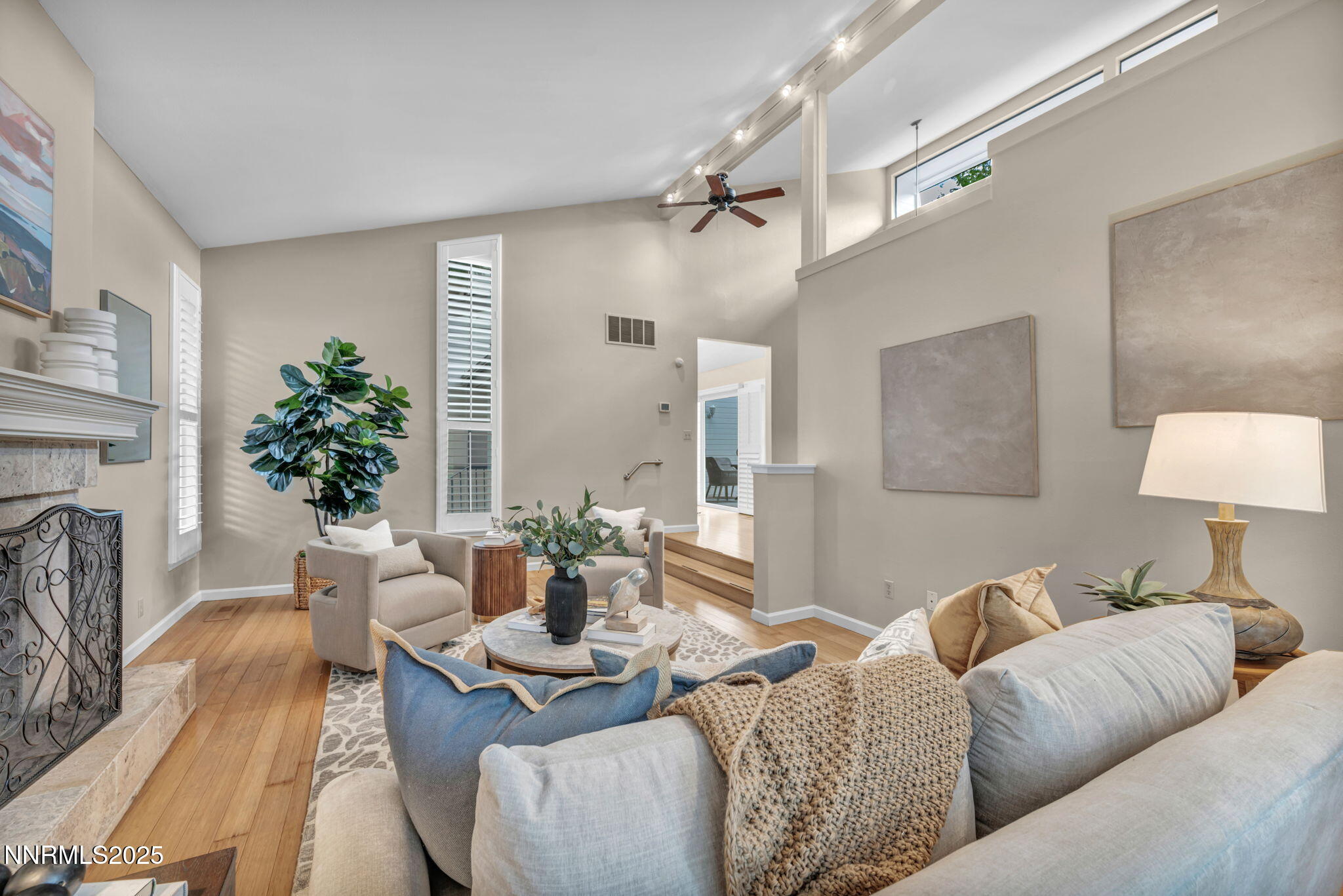 3904 Henry Court Reno, NV 89509 - Photo 12 of 32 a living room with furniture and a lamp