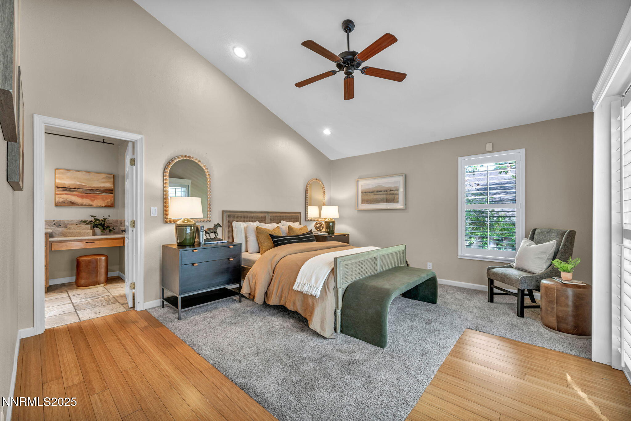 3904 Henry Court Reno, NV 89509 - Photo 13 of 32 a spacious bedroom with a large bed a table and chair