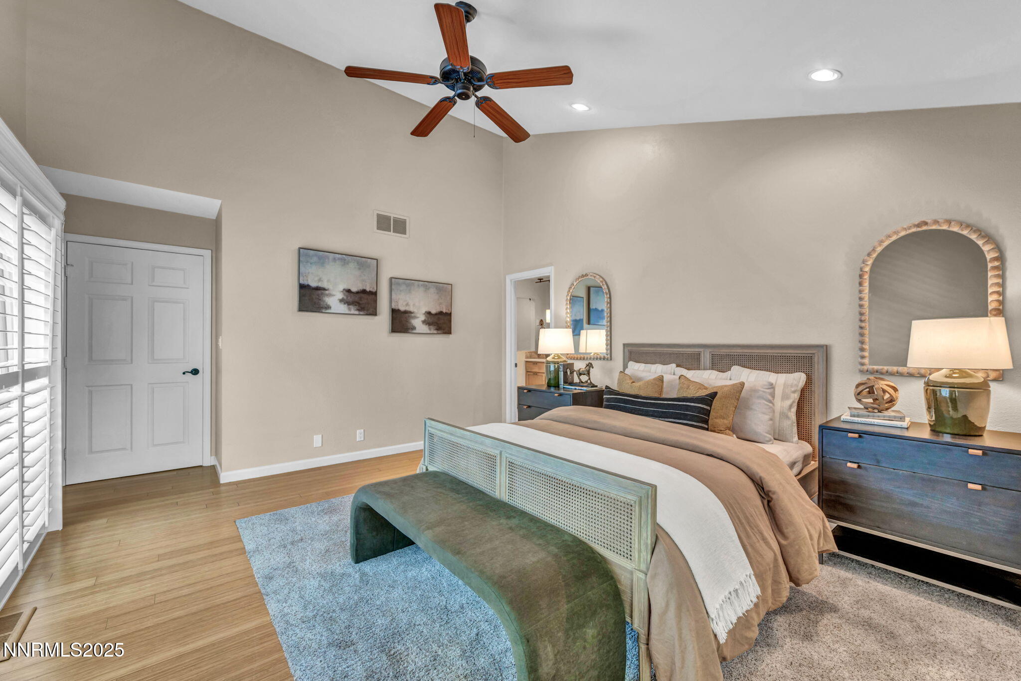3904 Henry Court Reno, NV 89509 - Photo 15 of 32 a bedroom with a bed and ceiling fan