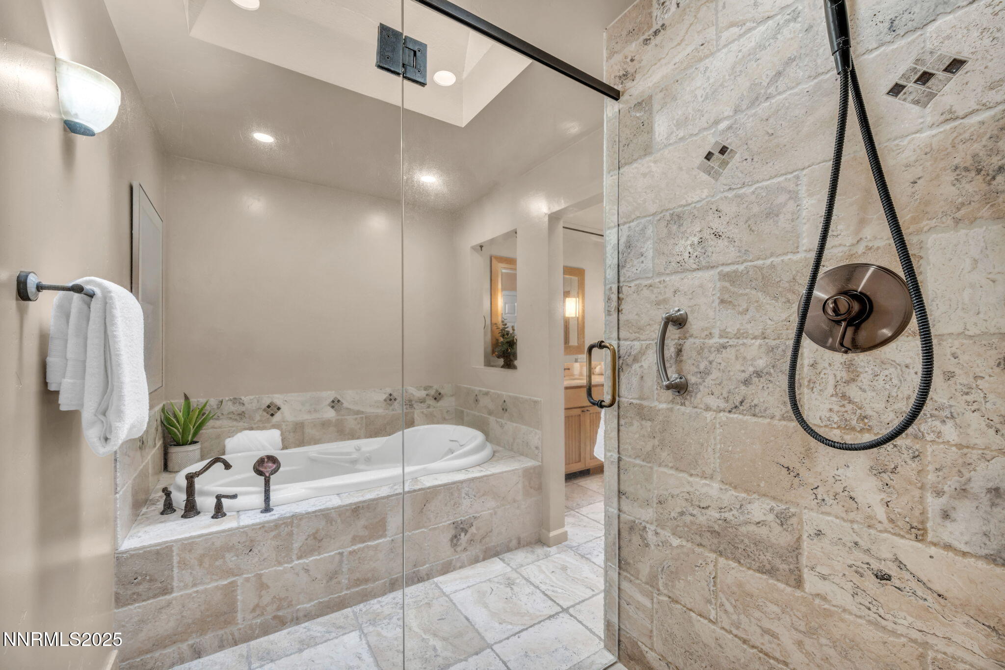3904 Henry Court Reno, NV 89509 - Photo 19 of 32 a spacious bathroom with a tub and shower