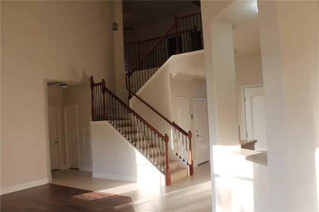 a view of stairs with wooden floor