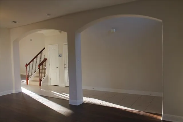 a view of entryway with wooden floor