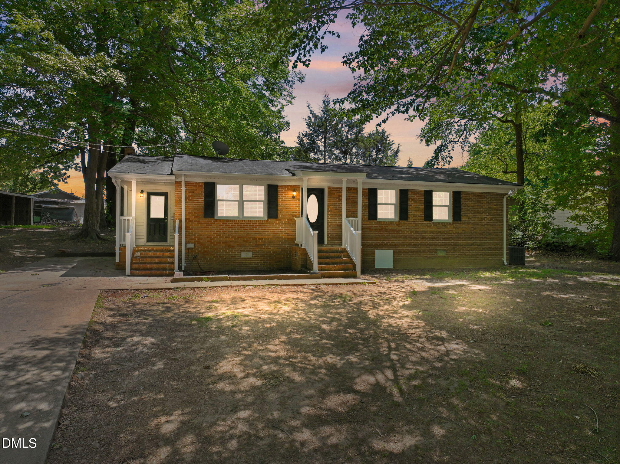 265 Shady Hill Circle Roxboro, NC 27573 - Photo 1 of 18 front view of a house with a yard