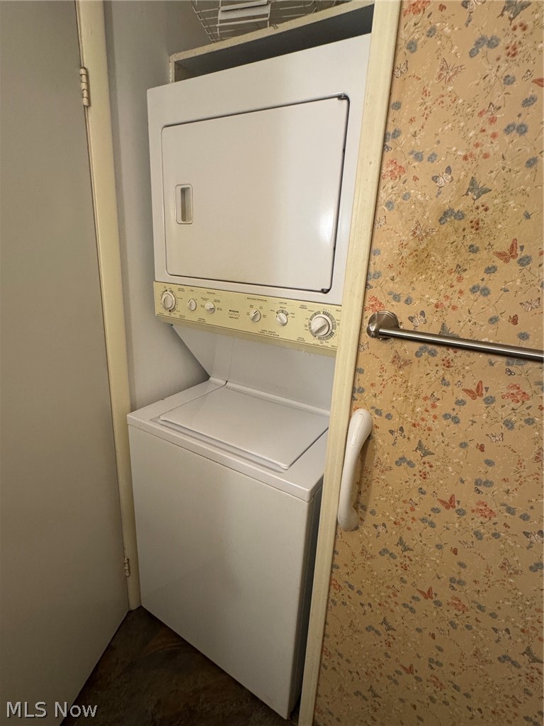 7294 Fox Mill Road, Unit 19D Mentor, OH 44060 - Photo 22 of 27 Vertical stackable washer and dryer unit within a dedicated utility closet