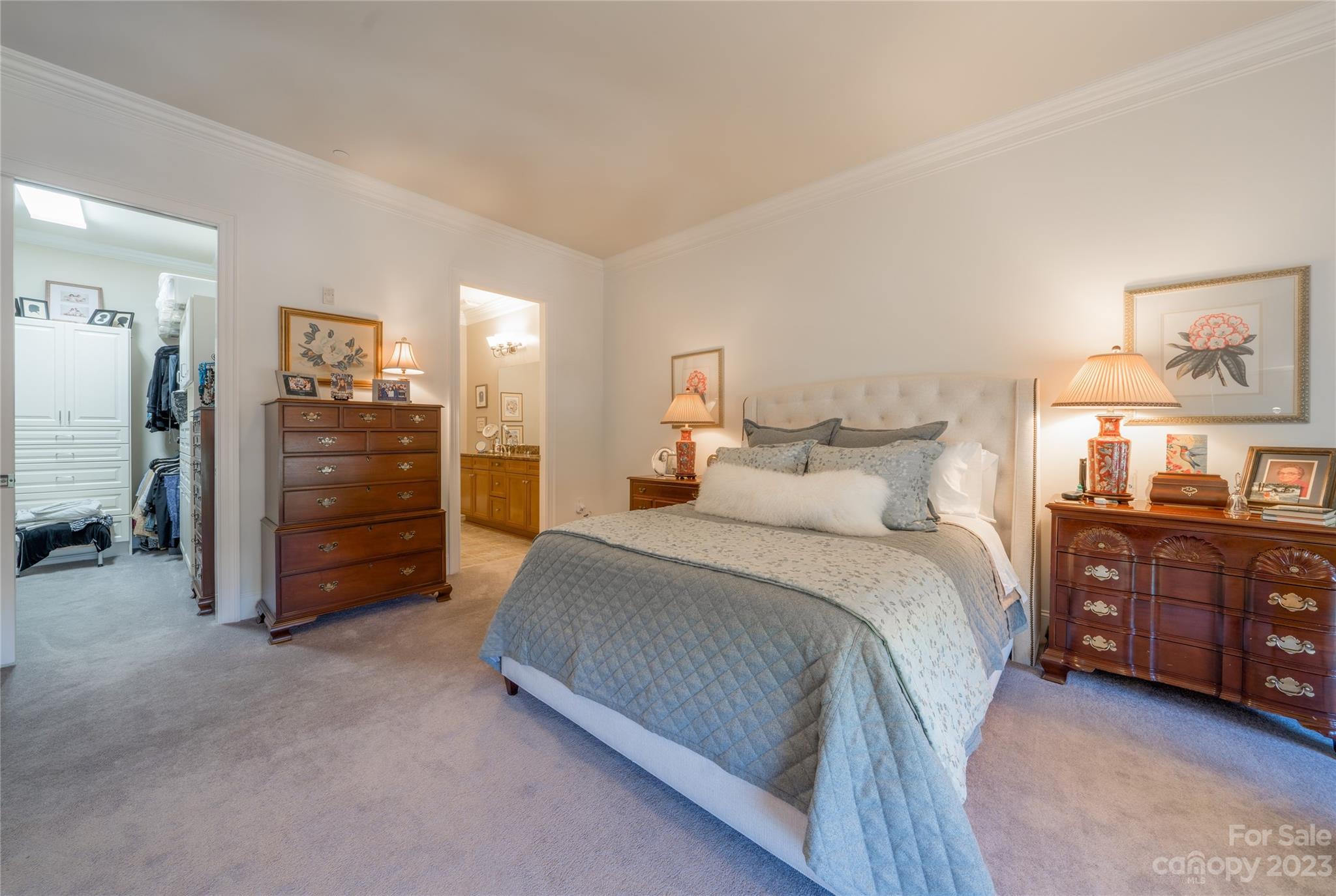 626 Queens Road, Unit 303 Charlotte, NC 28207 - Photo 29 of 41 a bed room with a bed and furniture