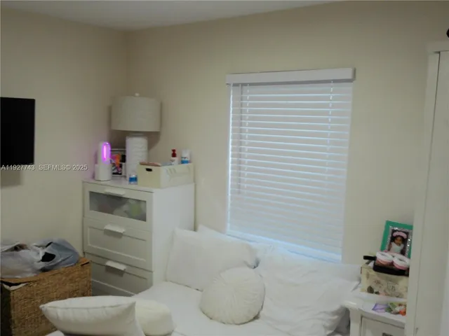 a bathroom with a sink toilet vanity and bathtub
