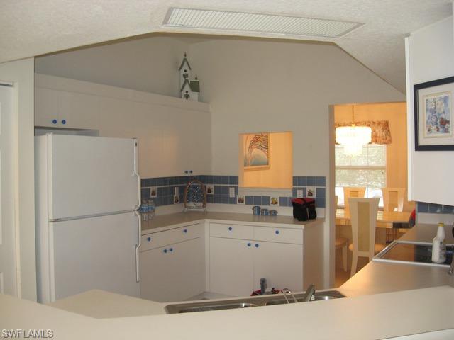 6834 Lantana Bridge Road, Unit 202 Naples, FL 34109 - Photo 5 of 13 Gallery Image 5