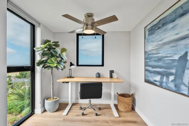 a white building with a yard