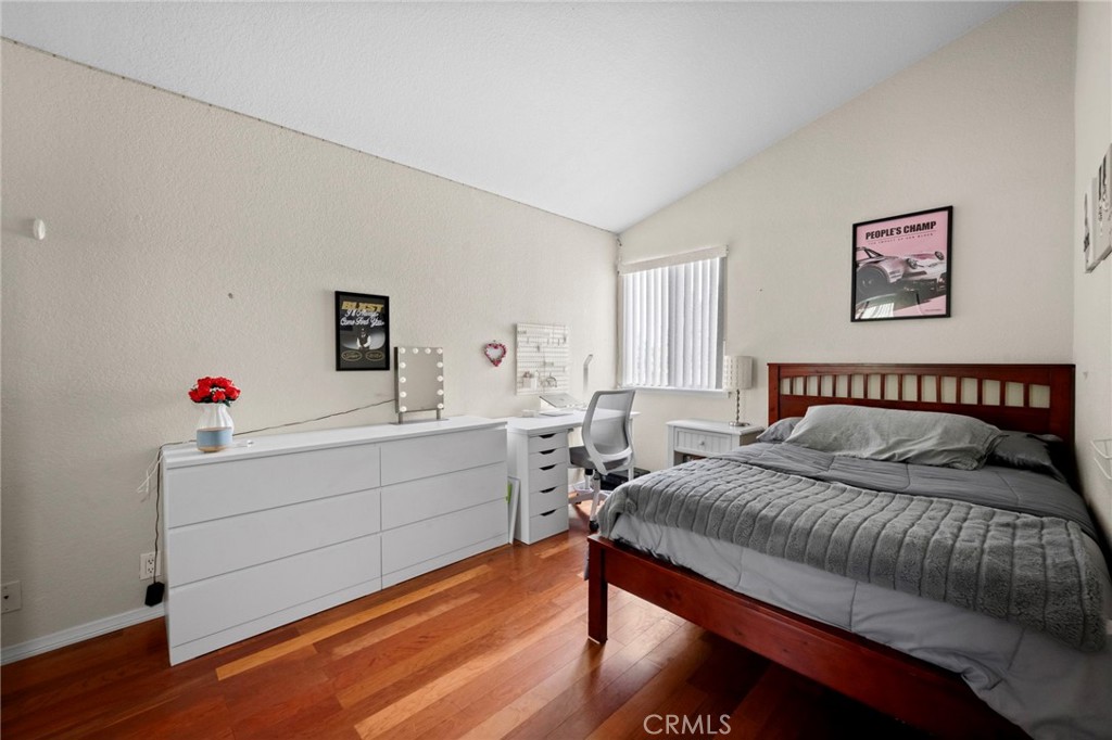 605 Bronco Way Walnut, CA 91789 - Photo 34 of 69 a bedroom with a bed and a table